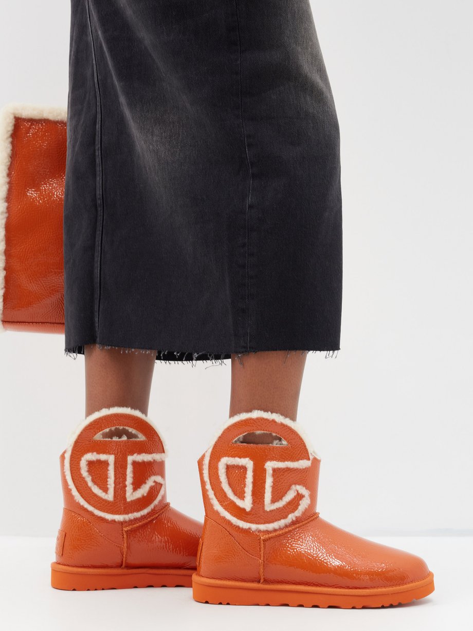 Ugg x Telfar Logo-cutout patent-leather boots - WARDROB